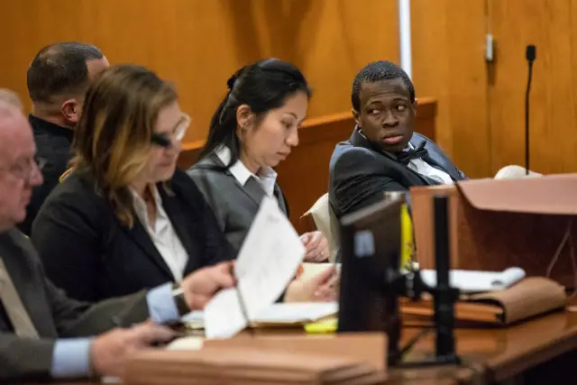 Chanel Lewis and his defense team during the first day of his retrial